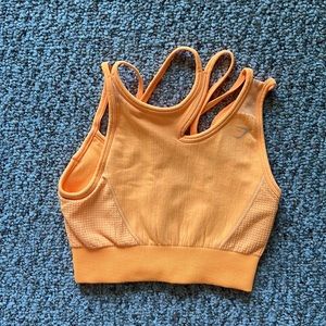 Gymshark Ultra Seamless Sports Bra in Orange size Small